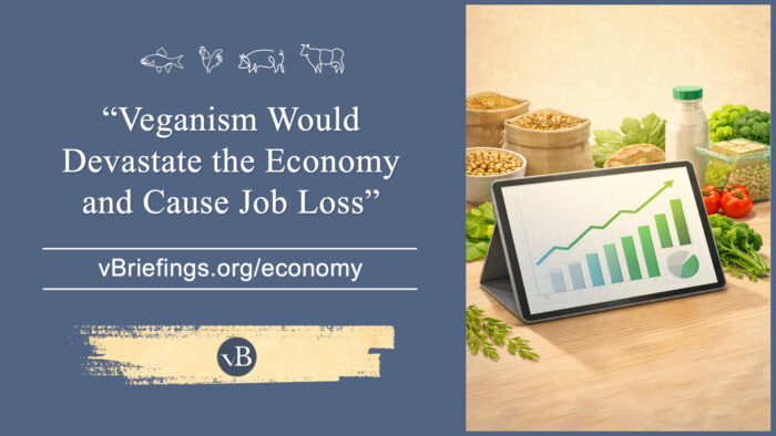 A graphic with small line-art animal icons across the top and the text “Veganism Would Devastate the Economy and Cause Job Loss” with the URL vBriefings.org/economy on a blue background, and on the right a painted scene of plant foods around a tablet displaying an upward-trending chart.